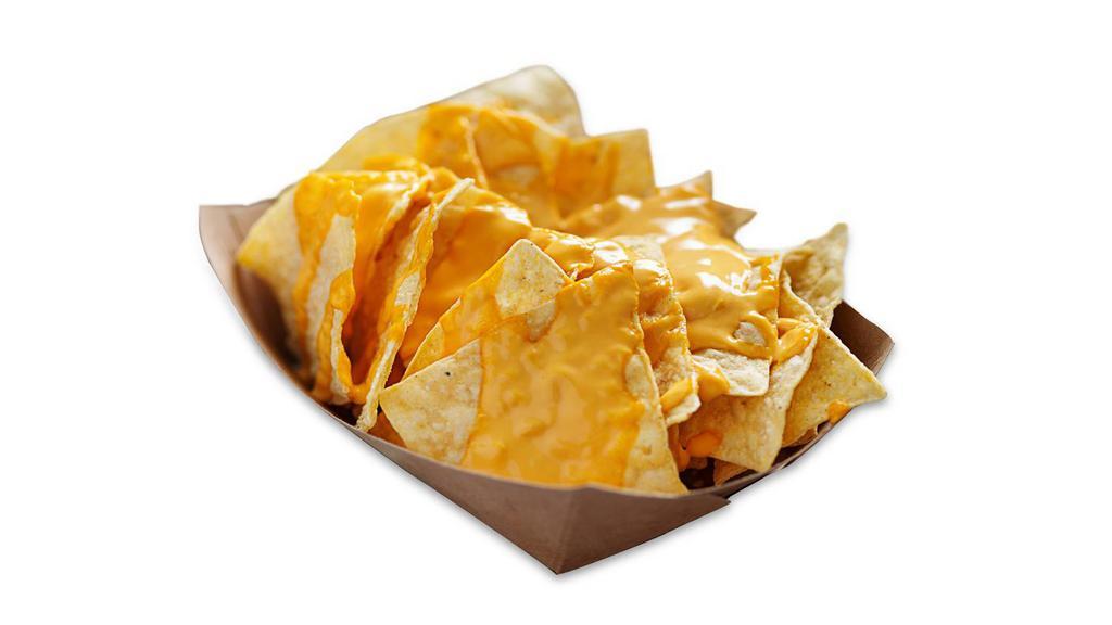 Nachos · Crispy corn tortilla chips with nacho cheese sauce.