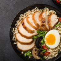 Shoyu Ramen · Fresh bowl of ramen served with a soy sauce-based broth, fresh vegetables and seasoned meat ...