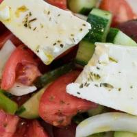Tomato Salad · Classic Greek with tomatoes, cucumbers, olives, feta