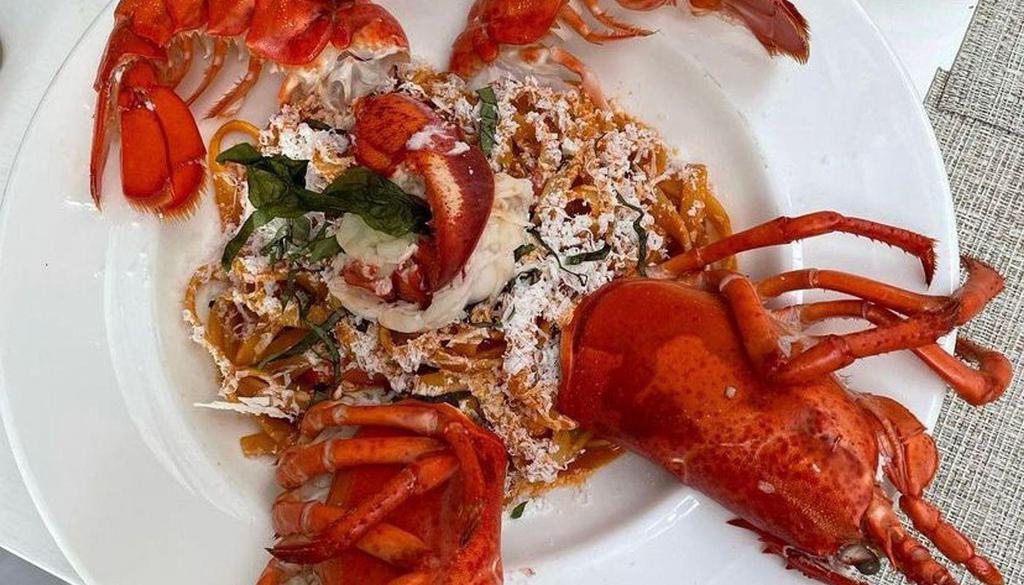 Lobster Pasta · Maine Lobster and hilopites with rich ouzo bisque.