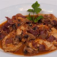 Veal Sorrentino Entree · Topped with eggplant, prosciutto and melted fresh mozzarella cheese in a light brown sauce w...