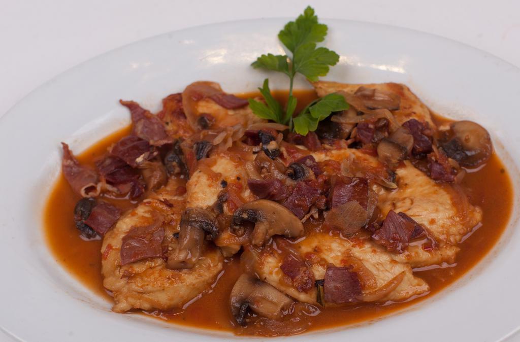 Veal Sorrentino Entree · Topped with eggplant, prosciutto and melted fresh mozzarella cheese in a light brown sauce with onion.