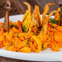 Arroz Con Mariscos · Yellow rice with seafood.