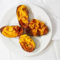 Potato Skins · With Bacon and Cheddar Cheese.