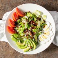 Cobb Salad · Chopped romaine with diced avocado, tomato, hard-boiled egg, bacon, and crumbled blue cheese.