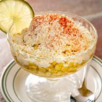 Esquites Zona Rosa · Corn kernels, epazote, Mexican mayo, cotija cheese, lime juice, and chile piquin.