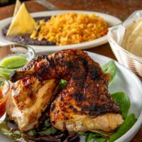 Pollo A Las Brasas · Glute-free. Slow roasted half  chicken, served w rice and beans and homemade tortillas. Sals...