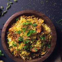 Vegetable Biryani · Include basmati rice sauteed with red onions, multi color bell pepper, broccoli, herbs, spic...