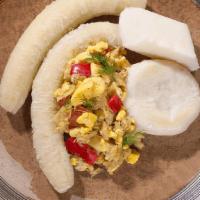 Ackee & Saltfish · The National dish of jamaica prepared with sautèed onions, pepper and spices. served with ya...