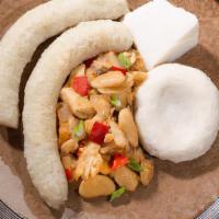 Butter Beans & Saltfish · Sautéed  saltfish,pepper,tomatoes ,thyme, scallion and butter beans served with yams, banana...