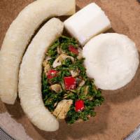 Callaloo And Saltfish (Codfish) · Green leafy vegetable cooked with salfish (codfish) served with yams, bananas and dumplins