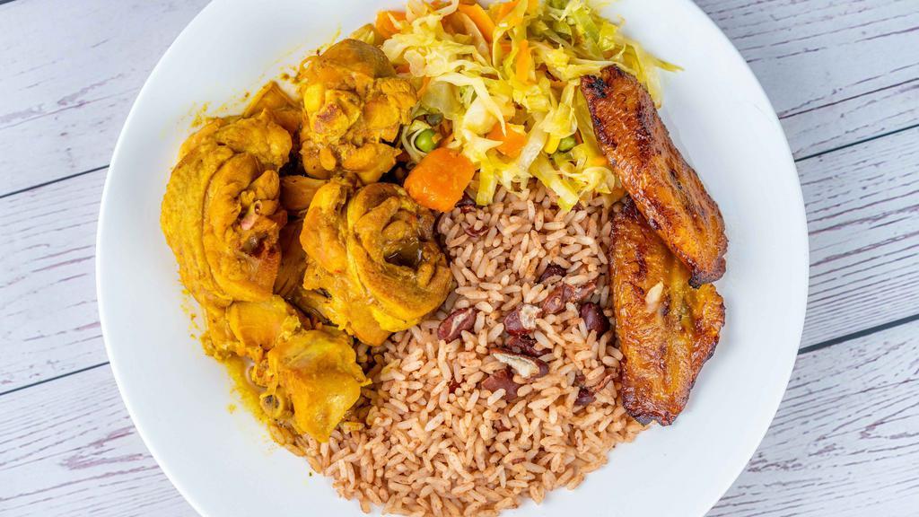 Curry Chicken · Pieces of chicken seasoned with Jamaican curry powder , fresh herb and spices  and cook until deliciously  tender . Served with two sides.