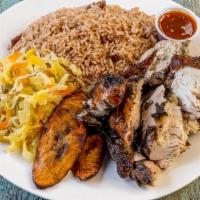 Jerk Chicken · chicken marinated in our special jerk marinade and grilled over open flame. served with two ...