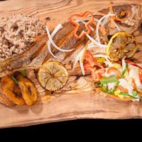 Escoveitch Red Snapper · Fried Red snapped topped with escoveitch vinaigrette (onion, scotch bonnet,pimento,carrots a...