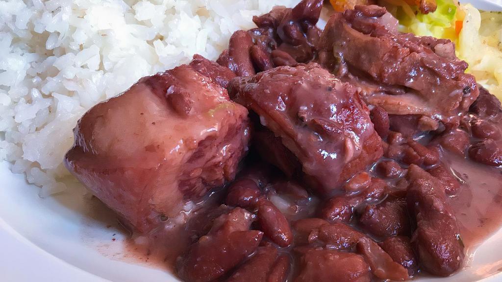 Stew Peas With Pigtail (Fridays And Saturdays) · This cozy  stew is made of red peas (beans) meat,pigtail , cook with coconut milk and seasoned with fresh herbs and spices.served with two sides.