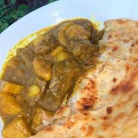 Goat Roti · Goat Roti is a type of wrap roti, filled With curried goat folded tightly within a roti or s...