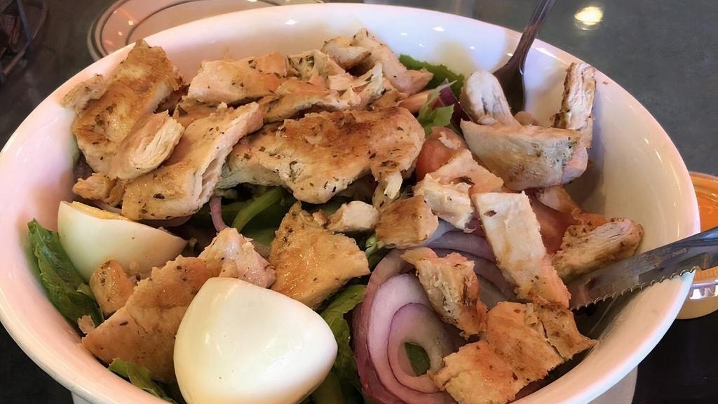 Chicken Salad · With grapes and walnuts over tossed salad.