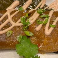 Pasteles · Our Puerto Rican Pasteles are stuffed with our signature pork, olives, red & green peppers, ...