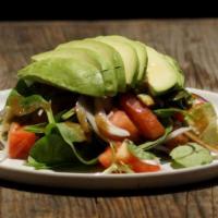 Ensalada De Cuba · Mixed green salad, avocado, cherry tomatoes, red onions and balsamic vinaigrette. Add chicke...