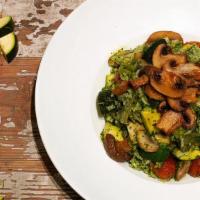 Paella Vegetariana · Cilantro rice, artichokes, carrot, portobello mushroom, fava beans, sweet peas
