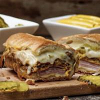 Sandwich Cubano · roasted pork, ham, pickles, swiss cheese, mustard, pressed cuban bread