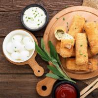 Mozzarella Sticks · Melted mozzarella cheese battered and fried to perfection.
