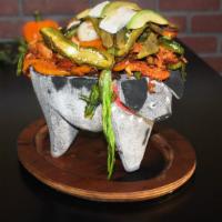 The Molcajete · The Traditional molcajete is a delicious mix of: Steak, Carne Enchilada (marinated Pork), Ch...