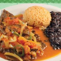 Bistec A La Mexicana · Beefsteak stir-fried with jalapeños, onions and tomatoes and other secret delicious spices a...