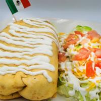 Classic Chimichanga · Deep fried rolled flour tortilla stuffed with rice, beans, cheese, the meat of your choice. ...