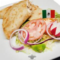 Quesadilla Corn Tortilla · 1 Large size Corn tortilla made at the moment folded in half filled with cheese and the topp...