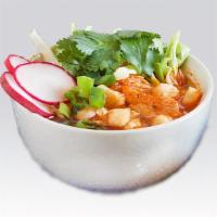 Pozole · Spicy. Broth made out of hominy (corn) kernels and garnished with shredded lettuce and radis...