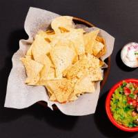 Chips And Guacamole · Tortilla chips with housemade fresh guacamole.