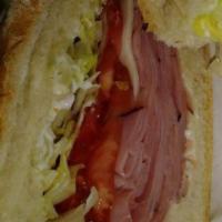 Turkey Club Sandwich · Turkey, bacon, lettuce, tomato & mayo.