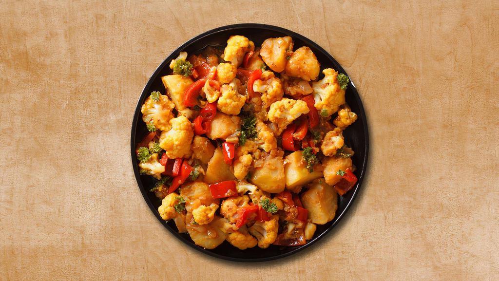 Og Potato & Cauliflower · Potatoes and Cauliflower, simmered to perfection in onion's, tomatoes and Indian spices.