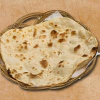 Simple Naan · Freshly made leavened dough baked in an authentic Indian oven
