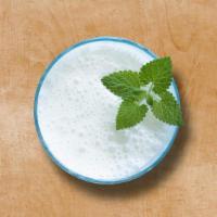 Flavored Lassi · Traditional yogurt-based drink that has a blend of fresh yogurt,water, spices and salt/sugar...
