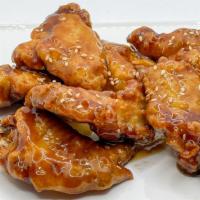 Teriyaki Wings · Double fried crispy chicken wings tossed in Teriyaki Sauce.