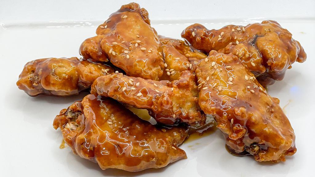 Teriyaki Wings · Double fried crispy chicken wings tossed in Teriyaki Sauce.