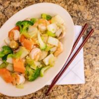 Moo Goo Gai Pan · Slices of white chicken stir-fried in white sauce with fresh mushrooms, cabbage, carrots, an...
