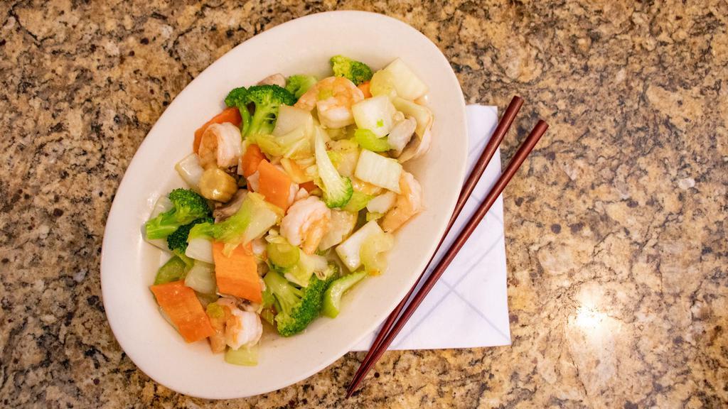 Moo Goo Gai Pan · Slices of white chicken stir-fried in white sauce with fresh mushrooms, cabbage, carrots, and celery. With white rice or brown rice.