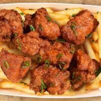 Hot Honey Thigh Basket (8 Pc) · 8 piece crunchy chicken thighs drizzled with Hot Honey Sauce, dusted with Carolina Reaper fl...