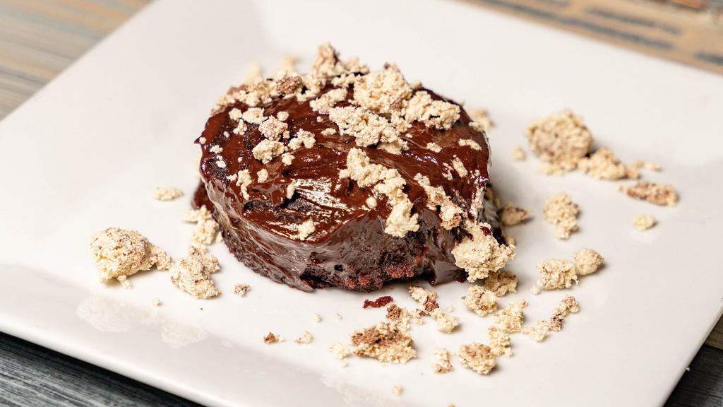 Warm Chocolate Cake · Chocolate ganache, sesame halvah.