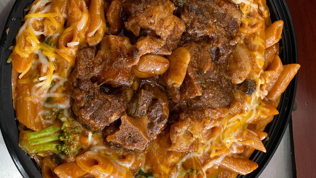 Oxtail Rasta Pasta · Add vegetable as an option (Brocolli or Spinach)