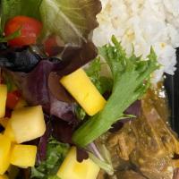 Curry Goat Large( Fri-Sun Only) · tenderly marinated in curry and other island spices ,served with white rice, brown rice or r...