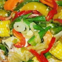 Snapper (Steam) · Snapper brown stewed in island spices and color ful bell peppers
