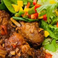 Brown Stew Chicken (Sml) · Chicken chopped in small pieces stew in bell peppers, seasonings . Nicely flavored .