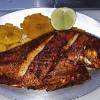Whole Tilapia (Fried) · WHOLE FRIED FISH SERVED WITH TOSTONES