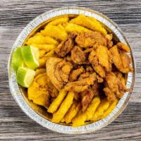 Fried Chicken Chunks · Served with fries or tostones.