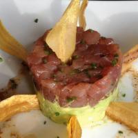 Tuna Tartare · Sesame & soy infused, served with avocado & plantains chips.
