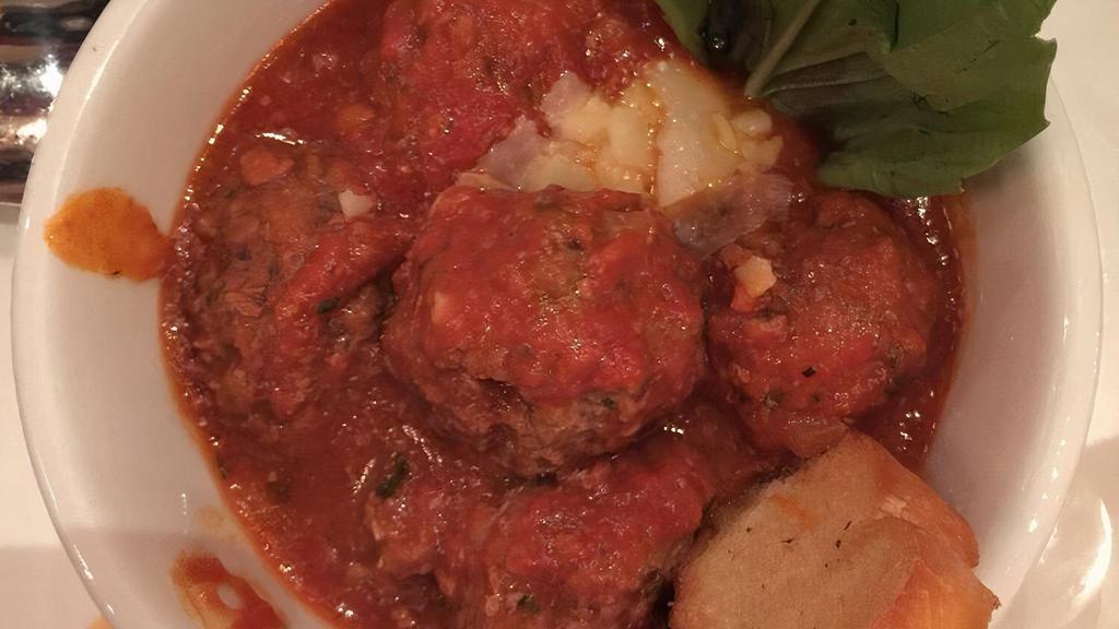 Chat Meatballs · Served in a savory tomato sauce.